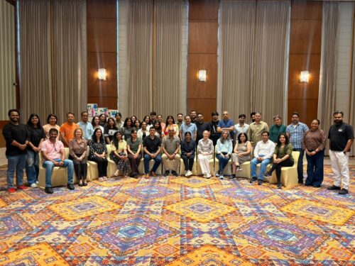 UoSD staff posing for a group photo taken at an all-staff away day